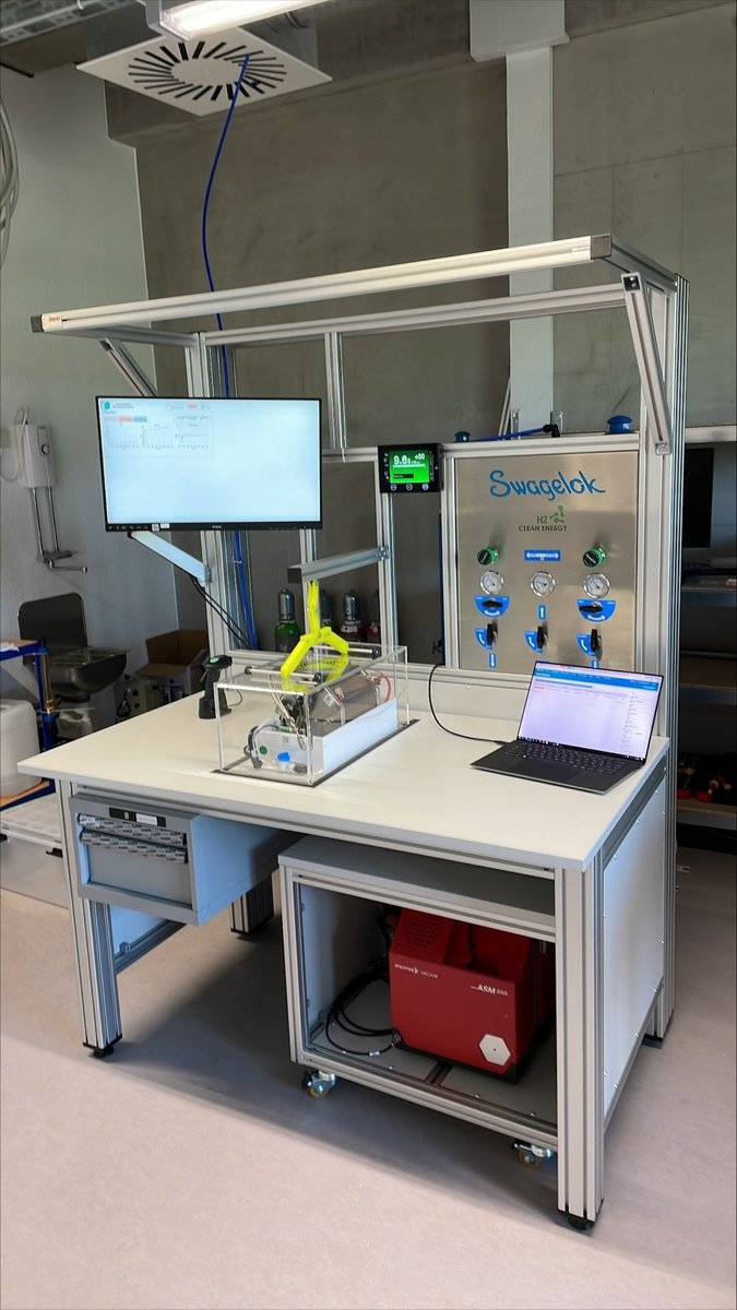 Completed accumulation chamber test station — full workstation with Pfeiffer ASM 800, accumulation chamber, Swagelok gas panel and test software