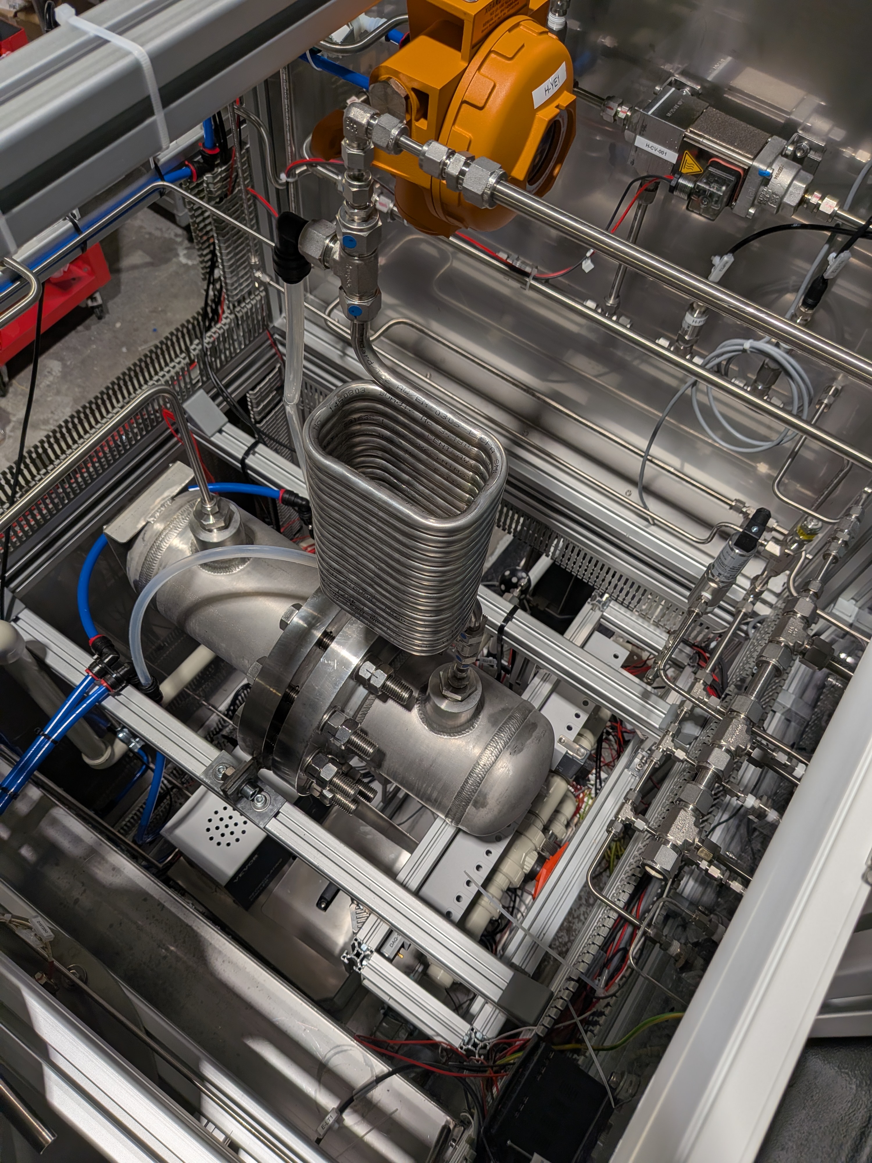 ATS5 internal layout — fluid systems, heat exchanger coil, and instrumentation